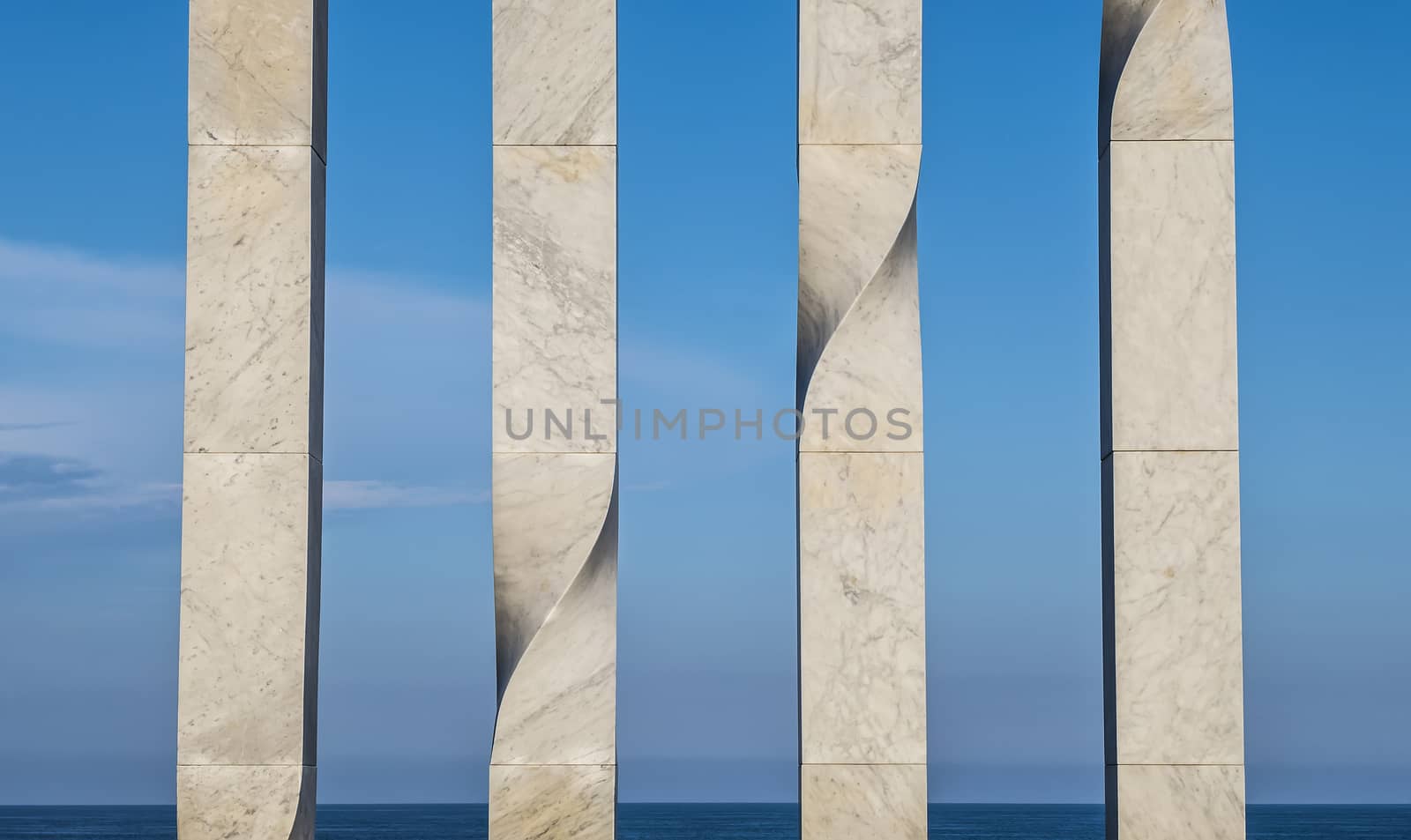 Columns in Barcelona beach