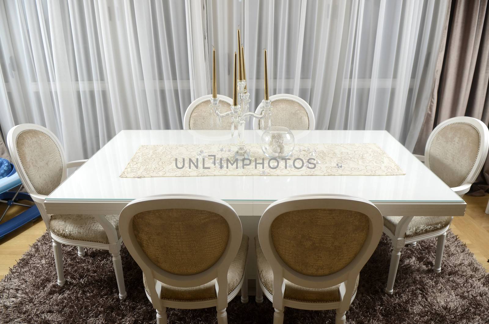 Empty White dining table at home in the evening