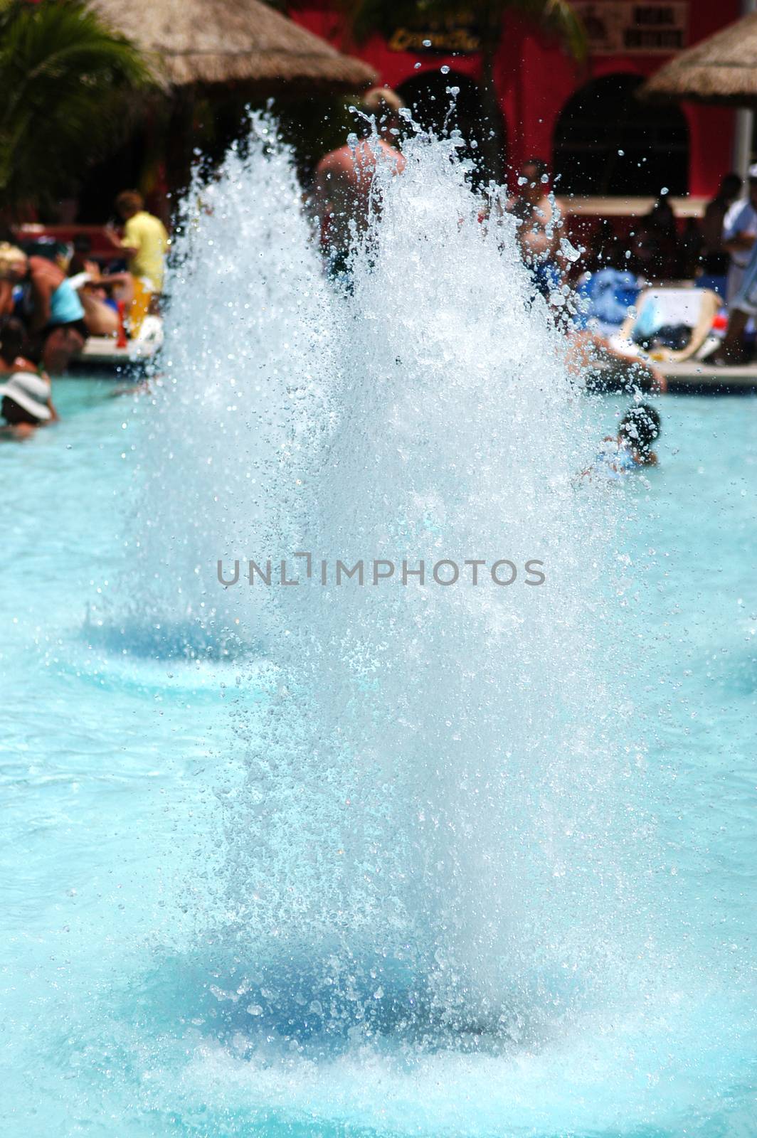 Beautiful fountain splashing water on a sunny day