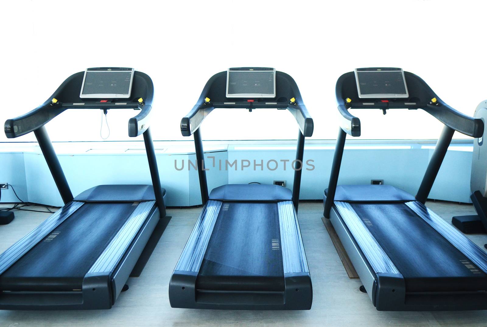 View on modern empty large gym with lot of weights