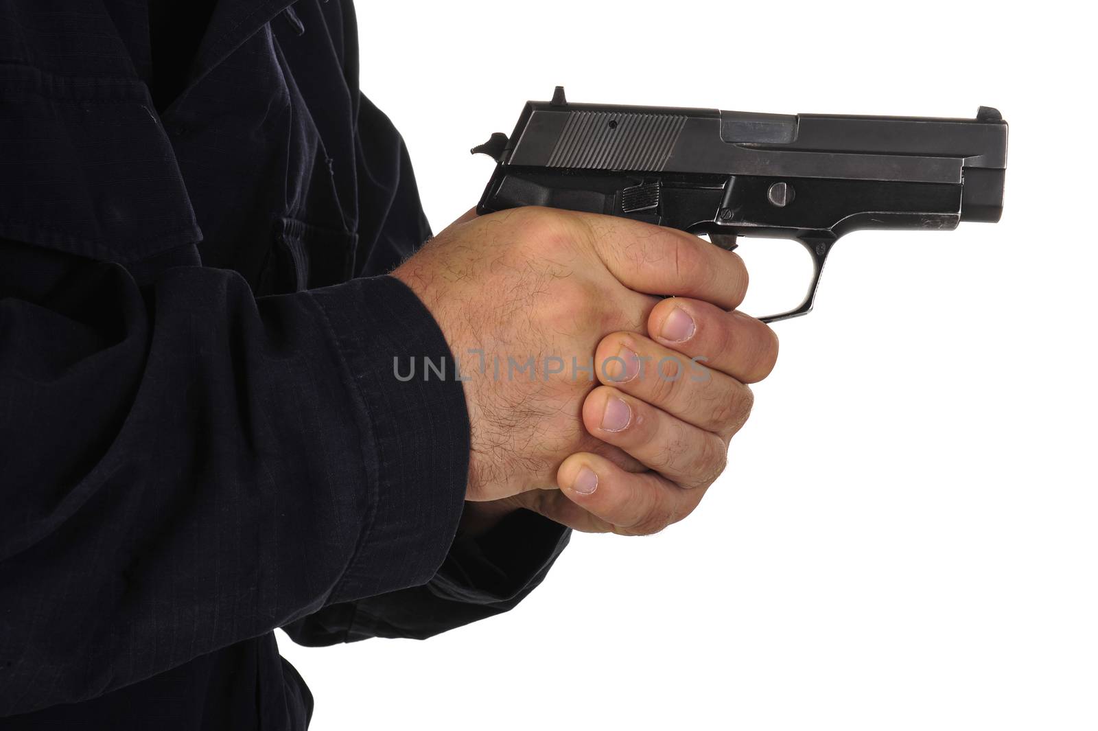 Close up view on gun in the hand on white background