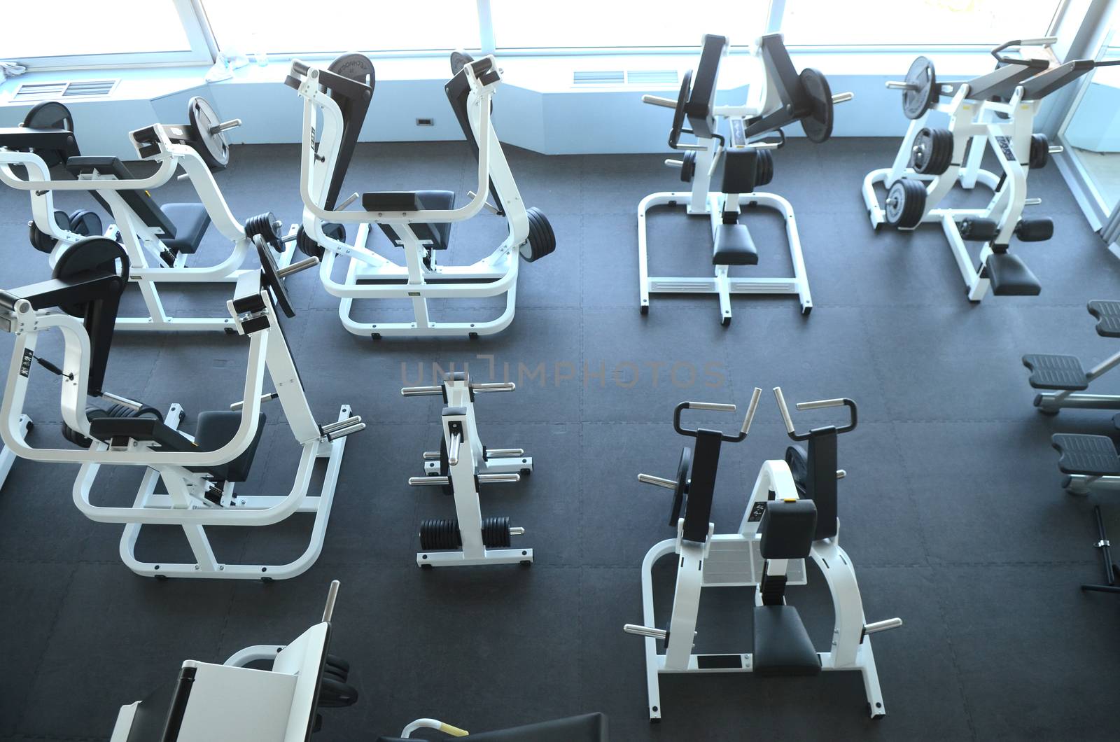 View on modern empty large gym with lot of weights
