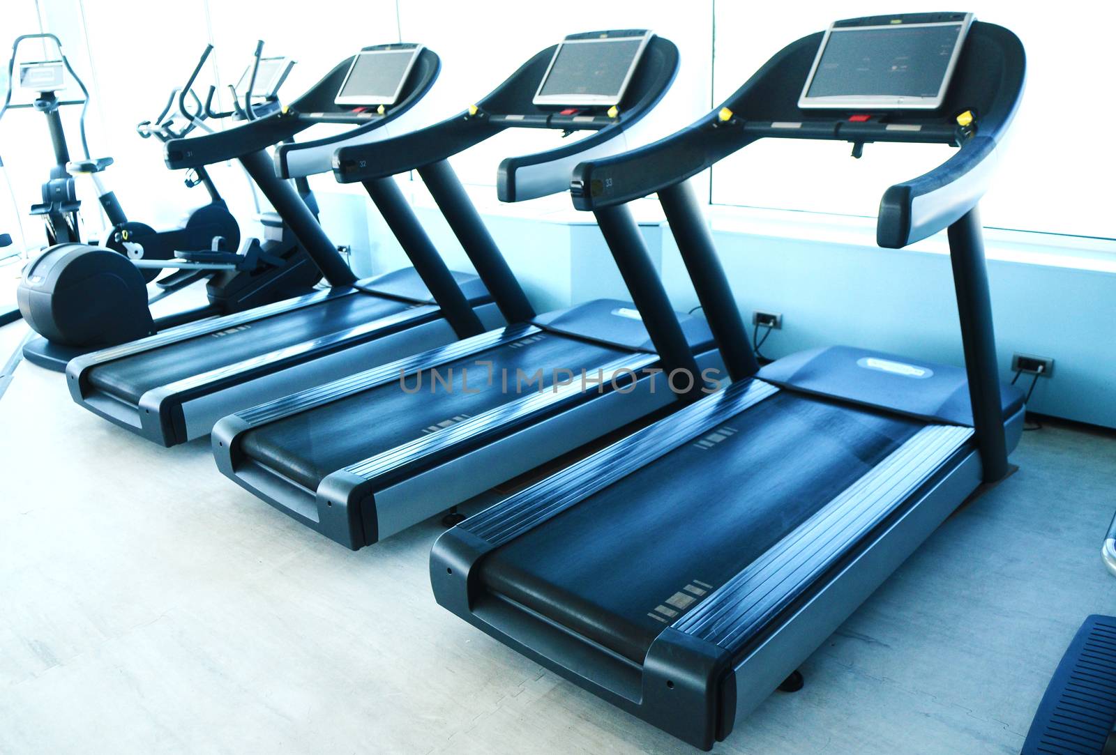 View on modern empty large gym with lot of weights