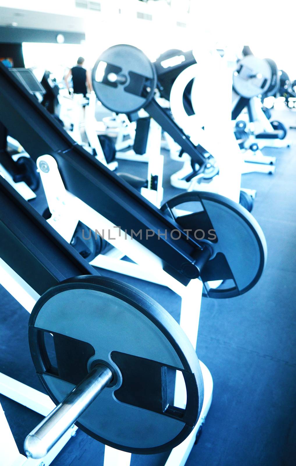 View on modern empty large gym with lot of weights