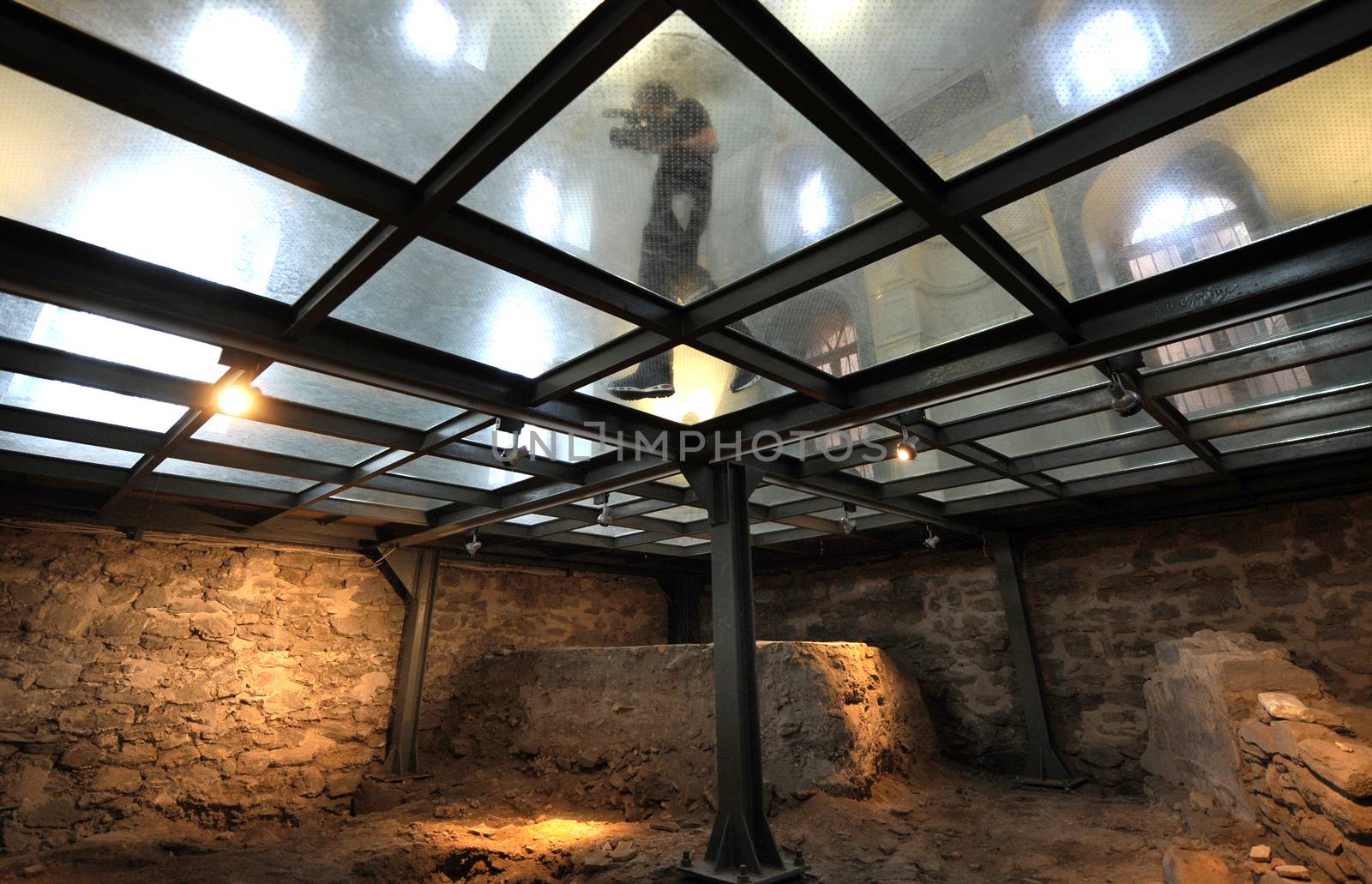 Man walking Glass floor from low angle view