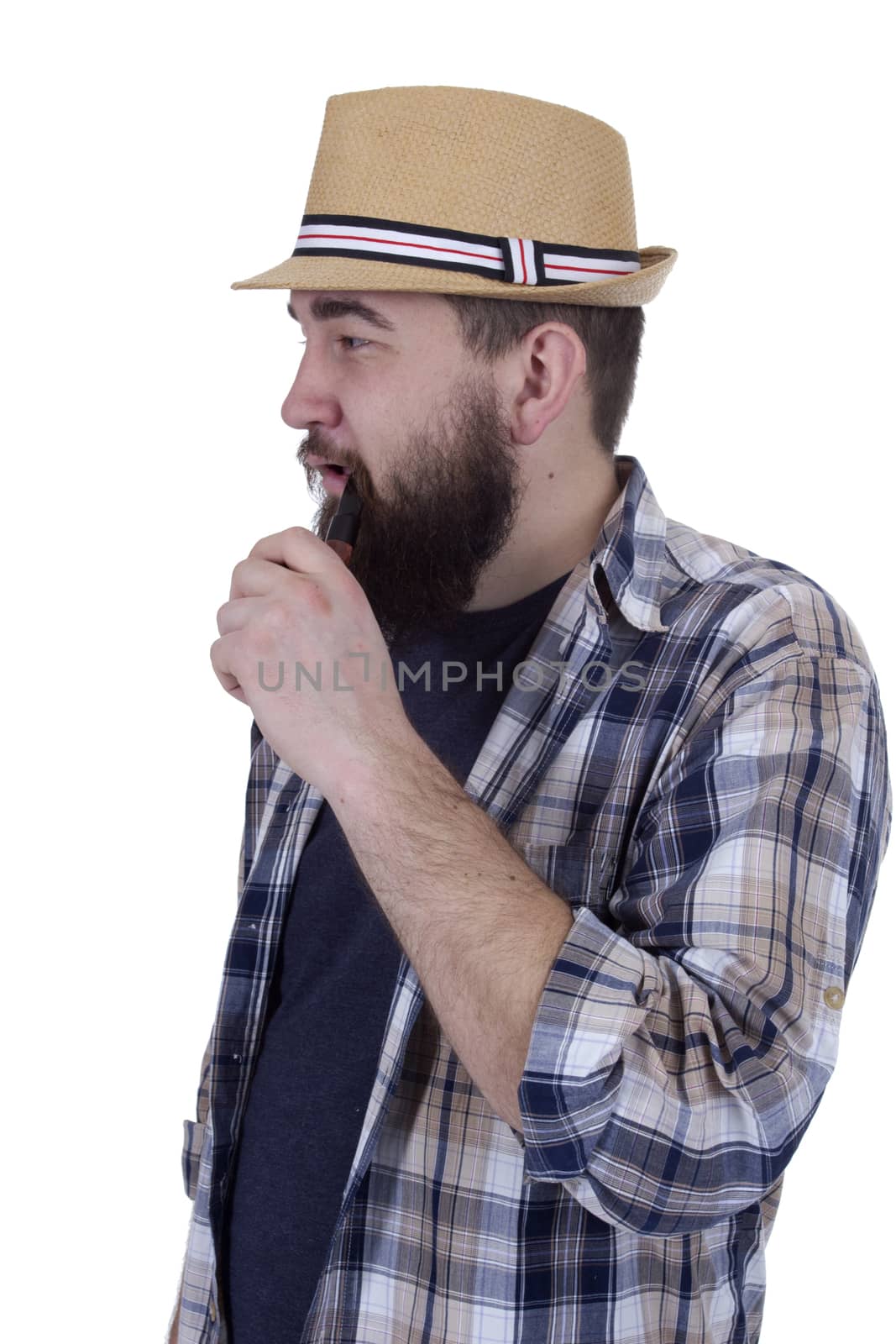 Handsome hipster smocking a pipe on a white background