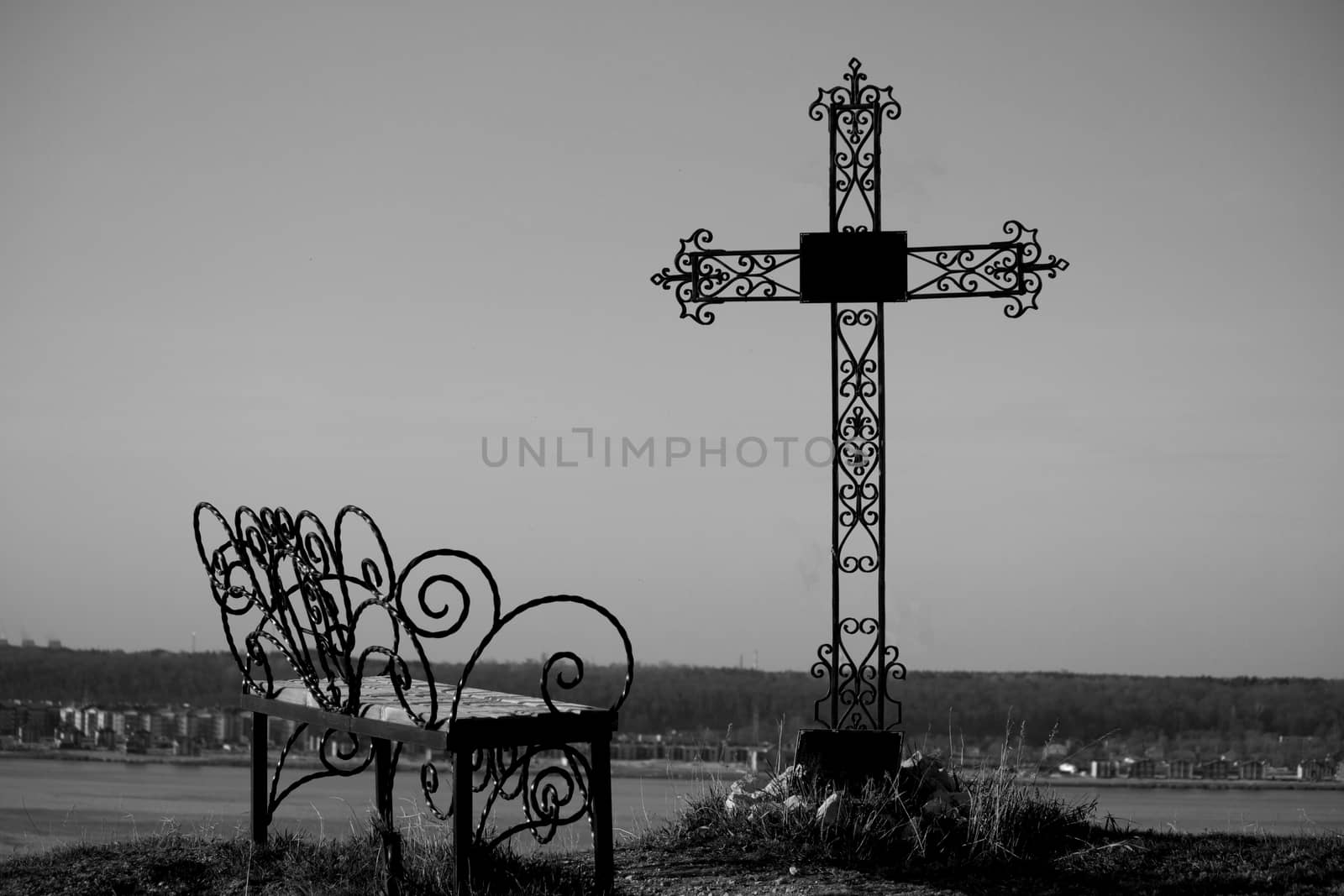 Graveyard cross in silhouette by liwei12