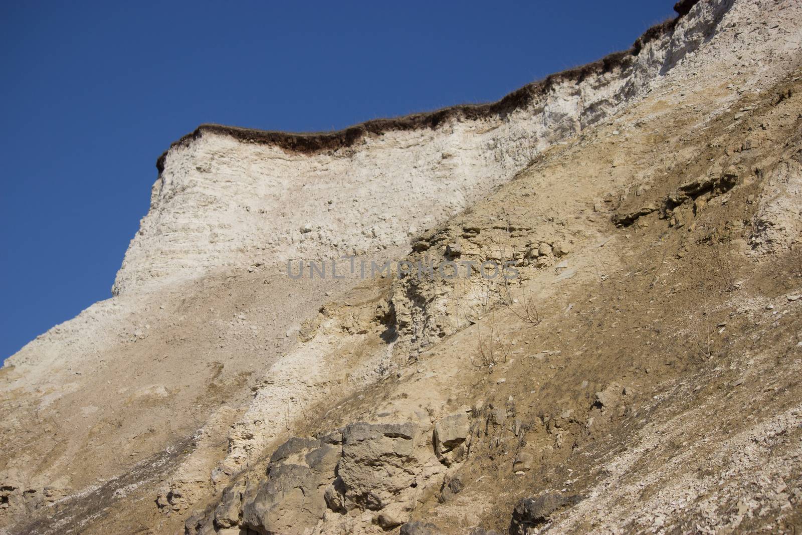 extraction of limestone concept. limestone mountain edge