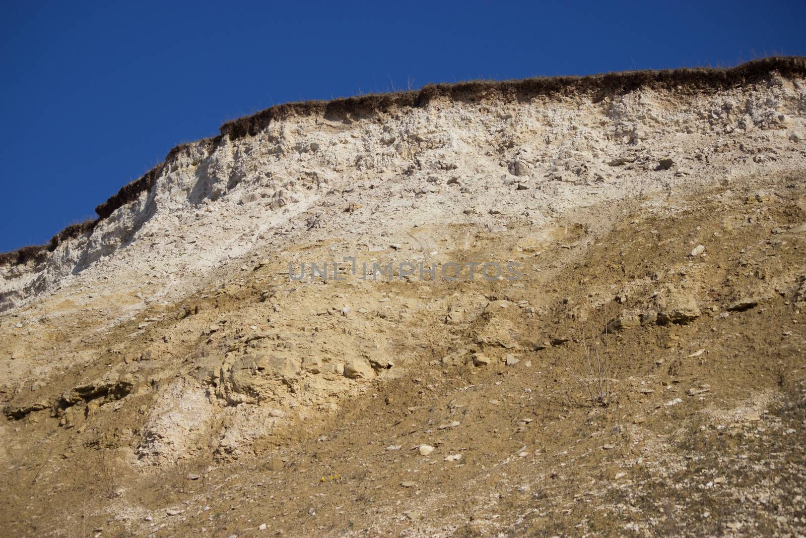 extraction of limestone concept. limestone mountain edge