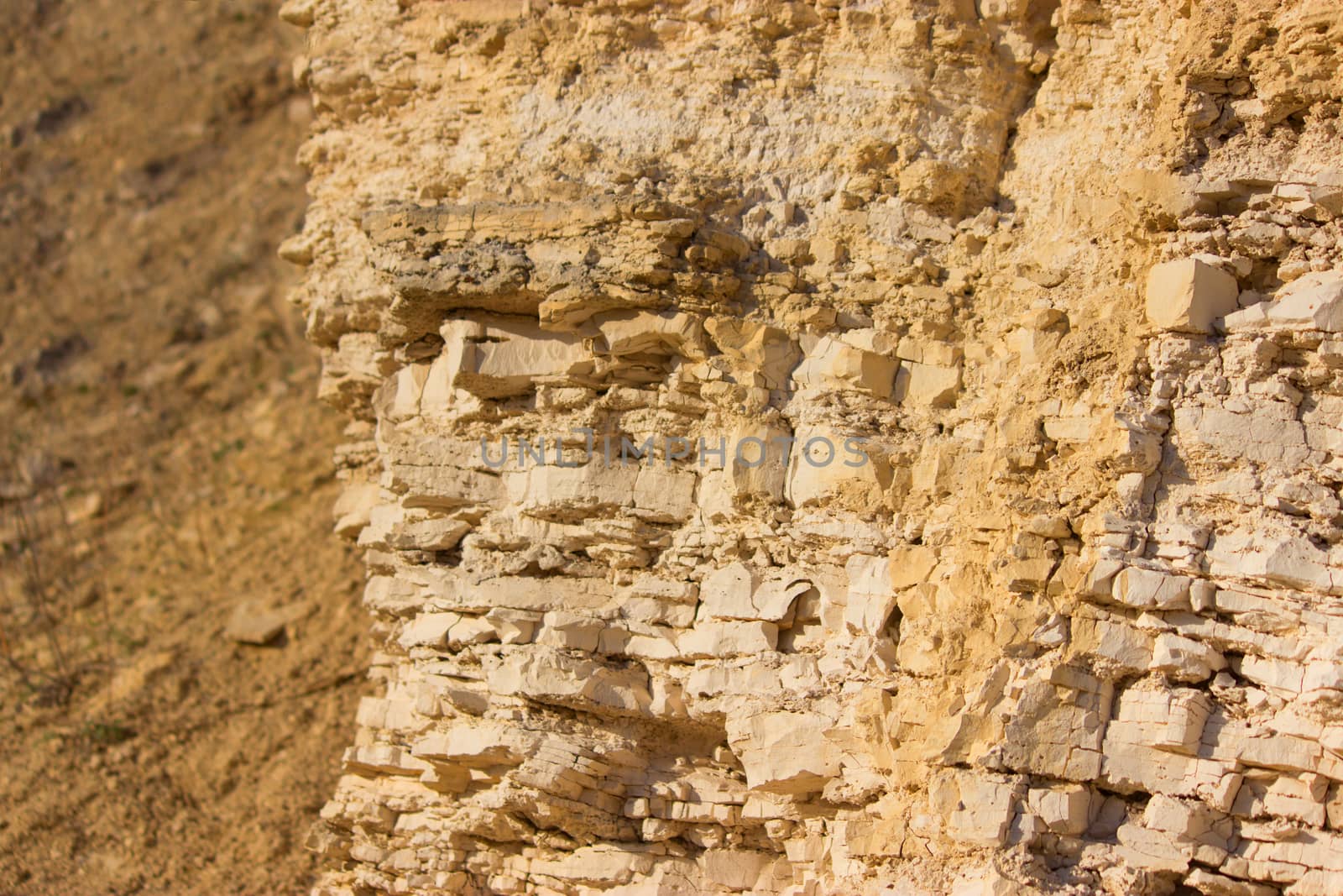 Wall of limestone beige. limestone extraction concept