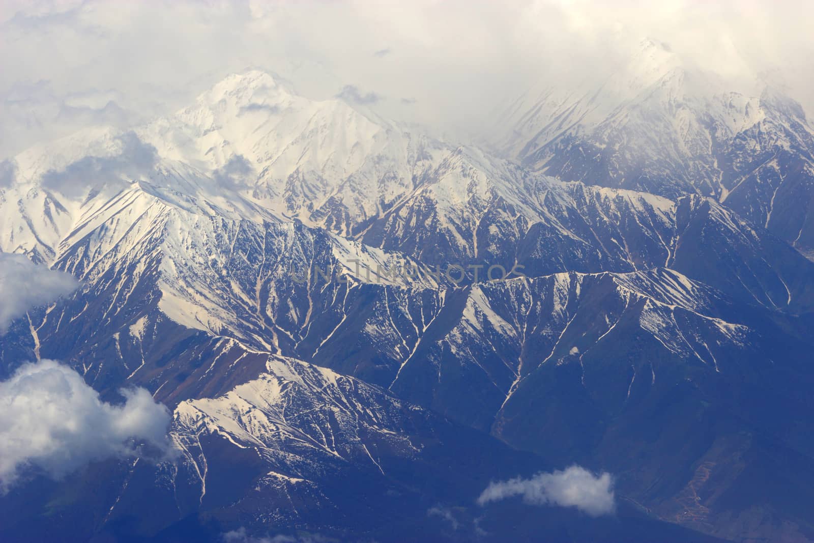 mountains with snow on top. aerial view from plain. Iran