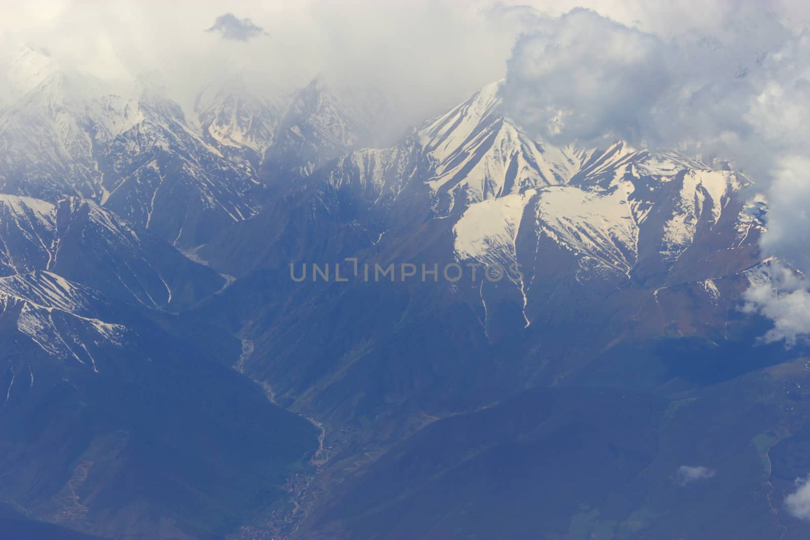 mountains with snow on top. aerial view from plain. Iran