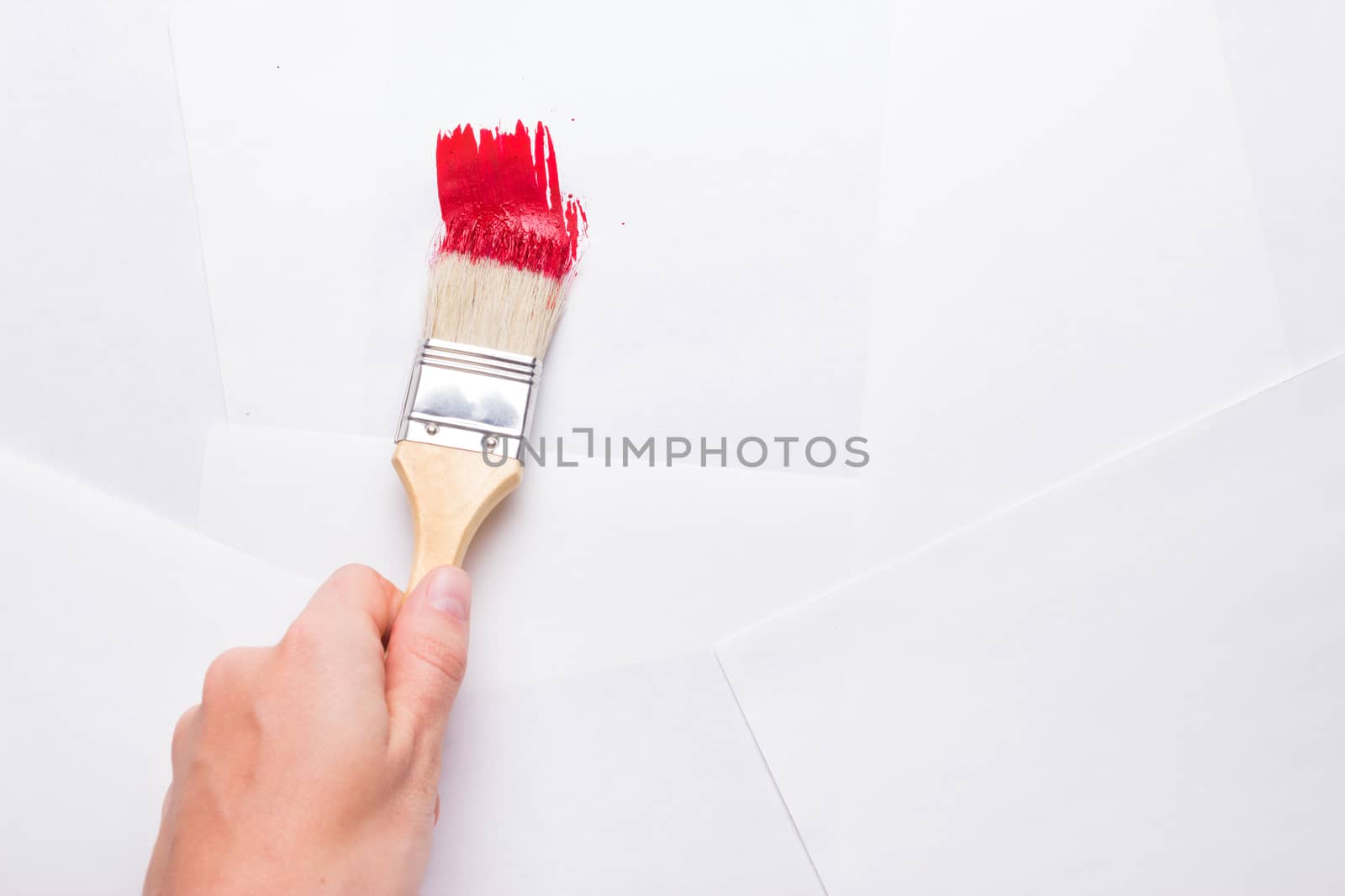construction brush in hand on white background. not isolated by liwei12