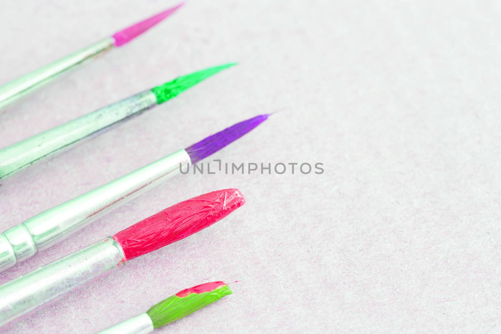 artistic colorful paint brushes with copy space