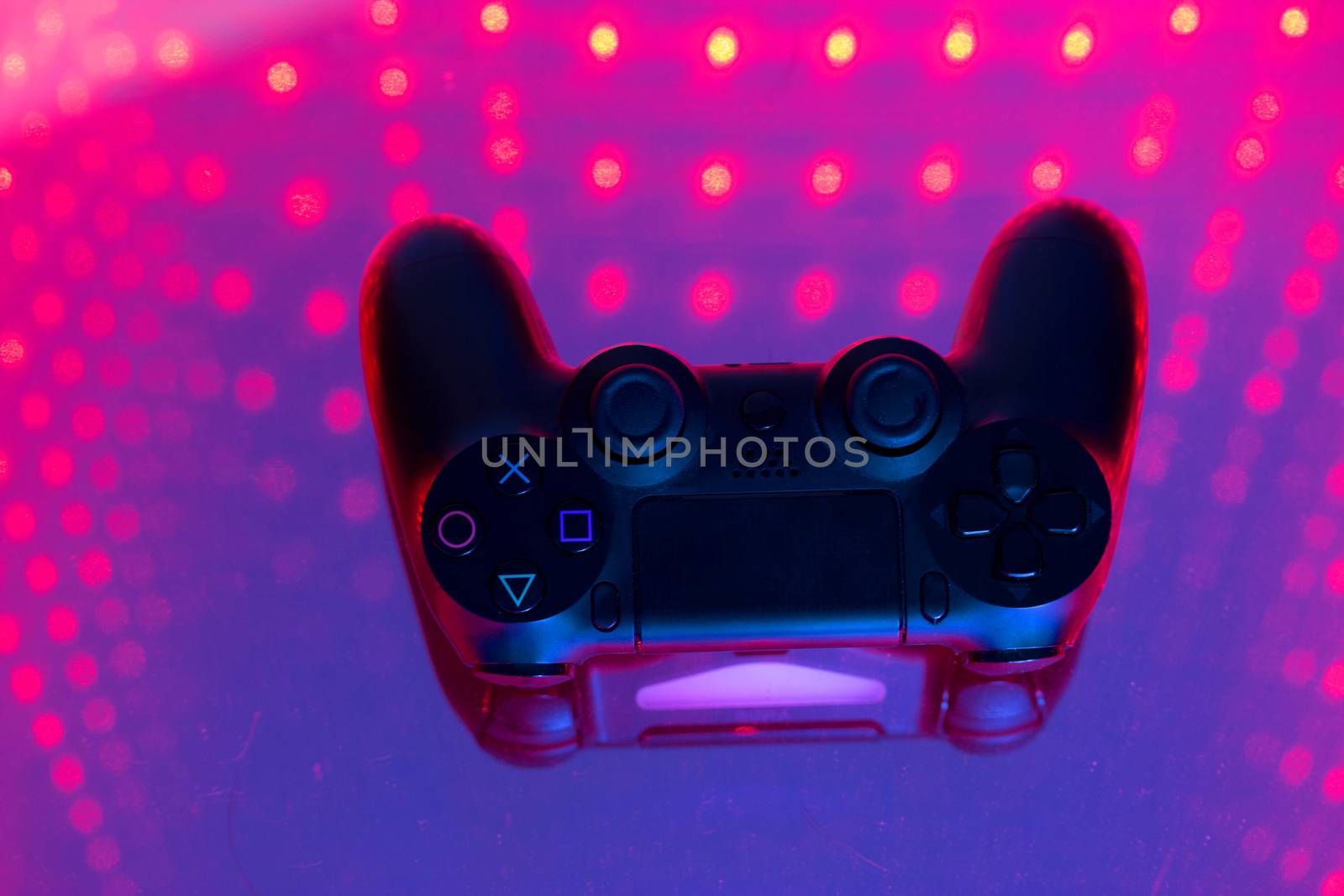 sony play station on illuminated table by liwei12