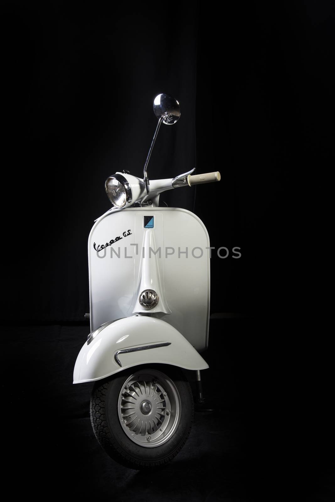 old white Vespa scooter