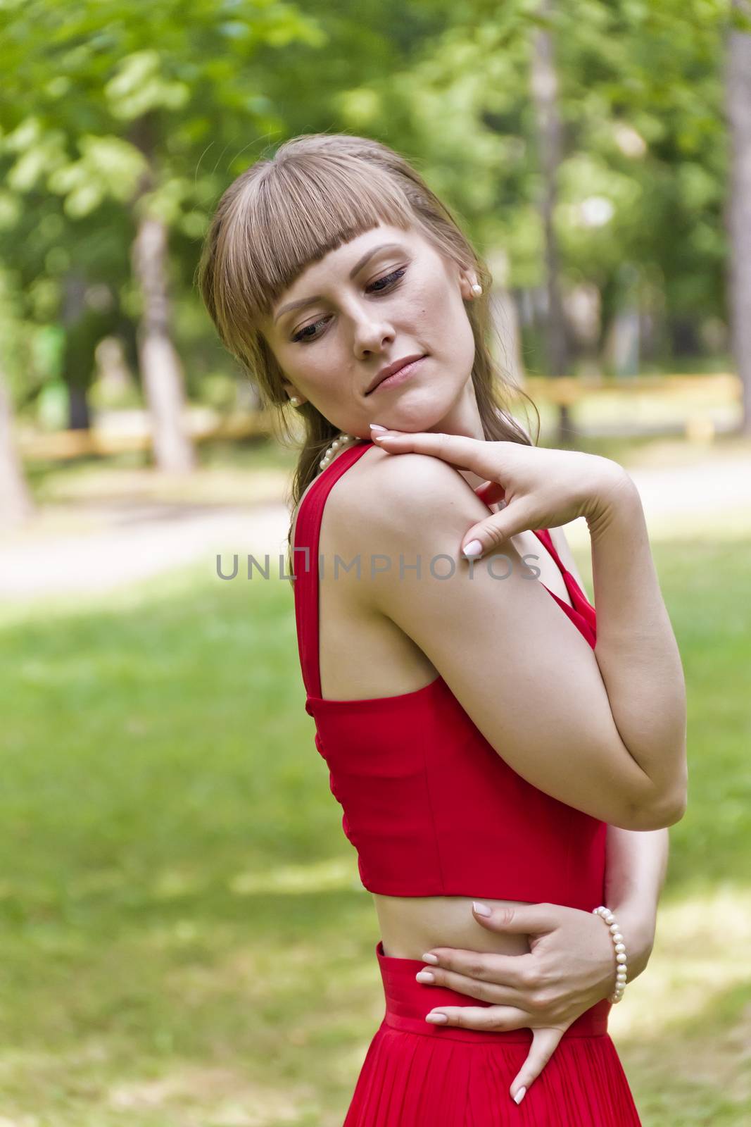 Portrait of beautiful girl with white pearl earring