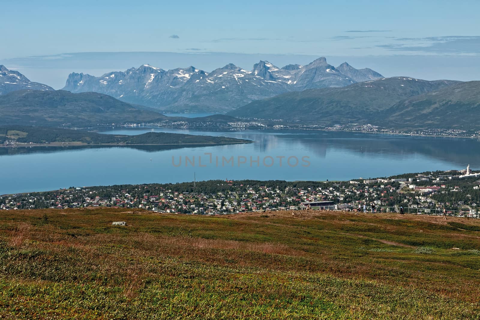 Mountains view and fjord in Tromso seen from the top of a mountain, Norway
