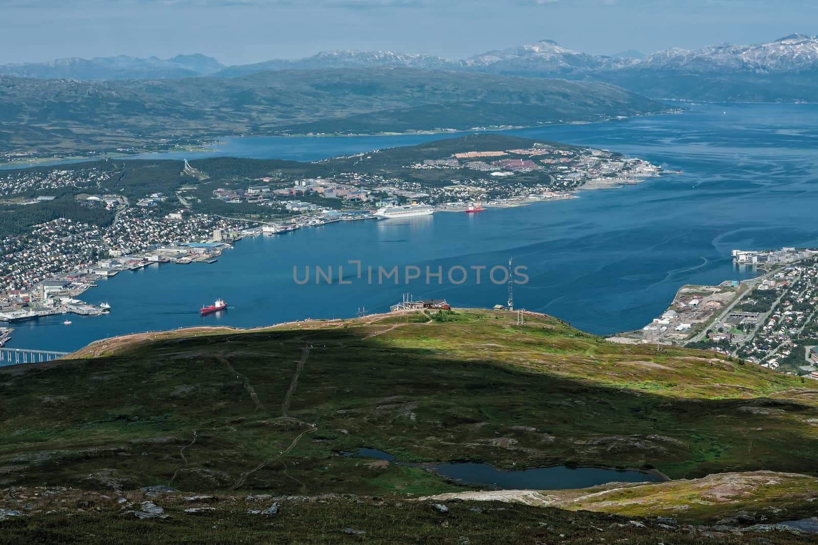 Panoramic view of Tromso and mountains seen from the top of a mountain, Norway