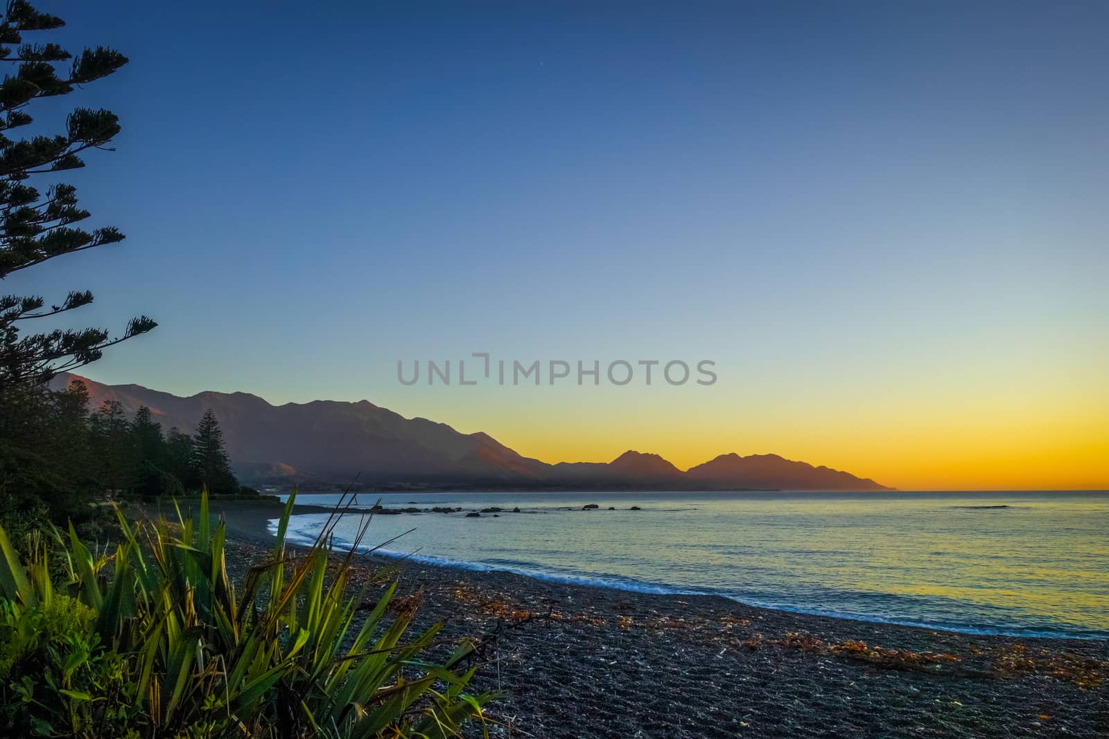 Sunset on Kaikoura beach, New Zealand by daboost