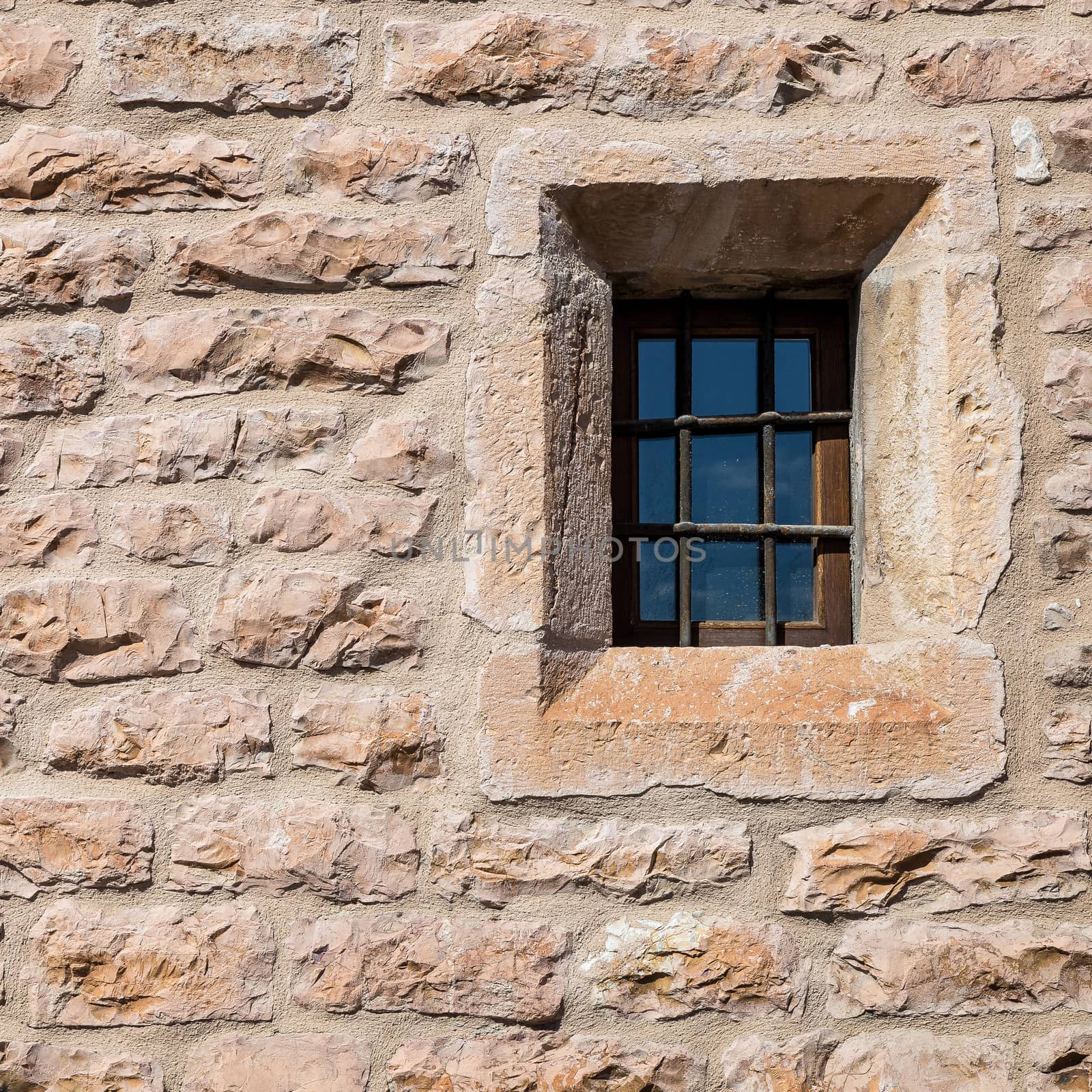 Assisi (Italy): Window on medieval stone wall