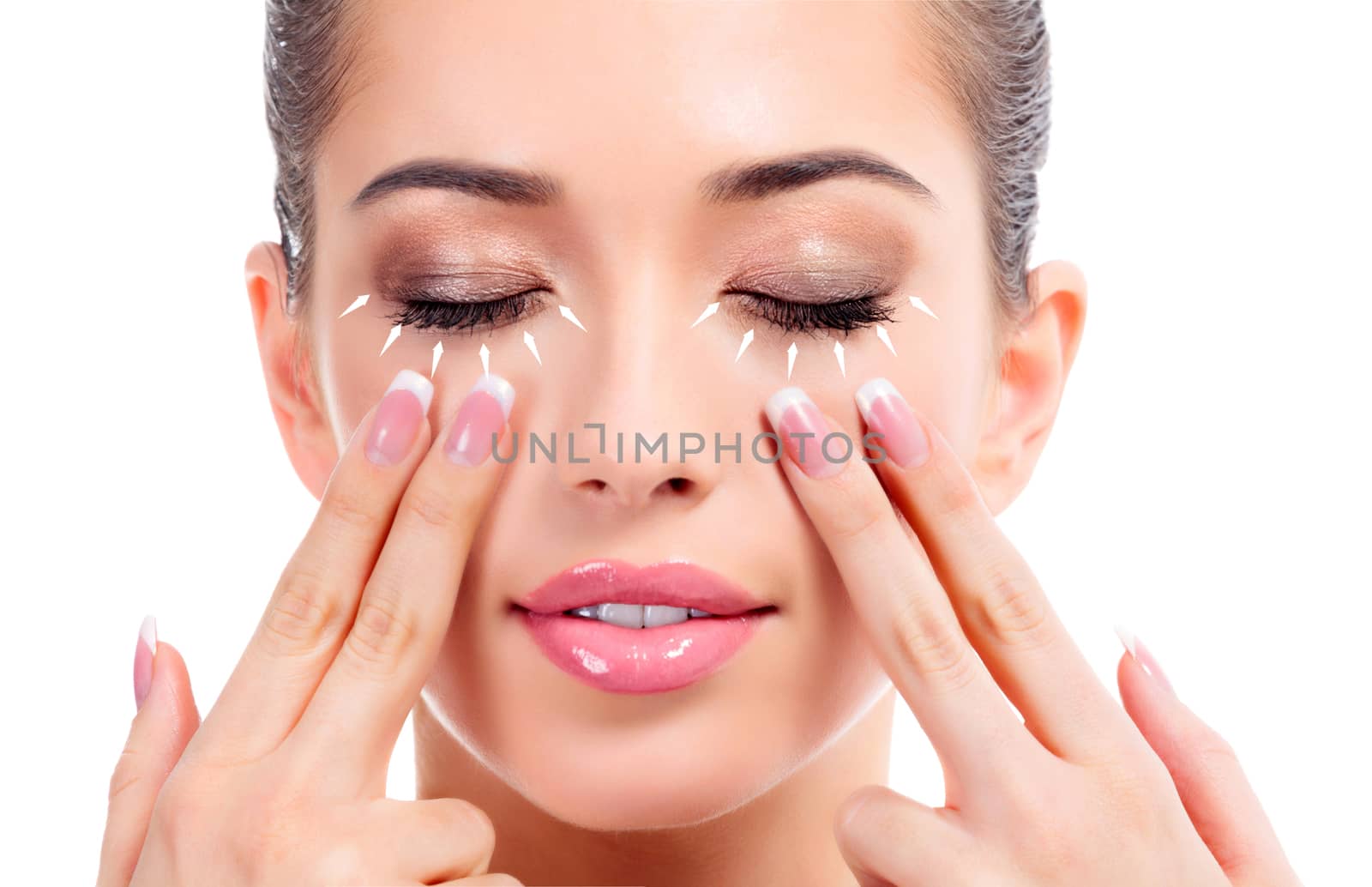 Closeup shot of young beauty woman massaging her face. Facial ma by Nobilior