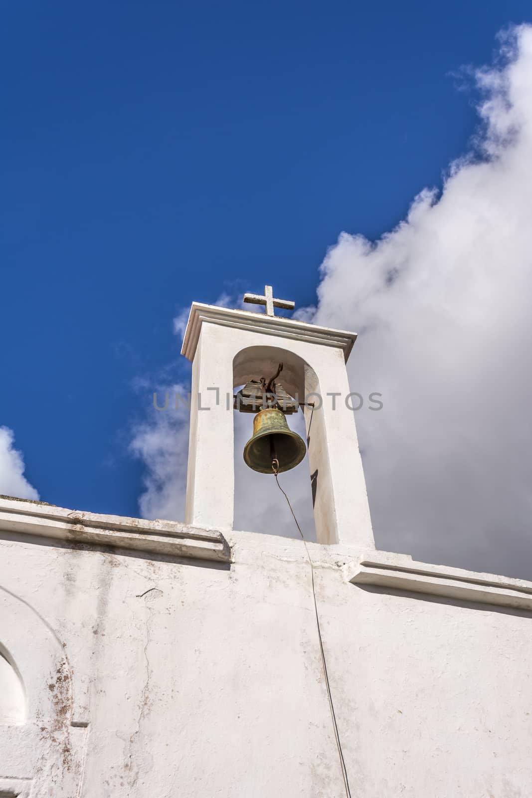 Bell tower in the village Chamaitoulo, Crete, Greece by ankarb