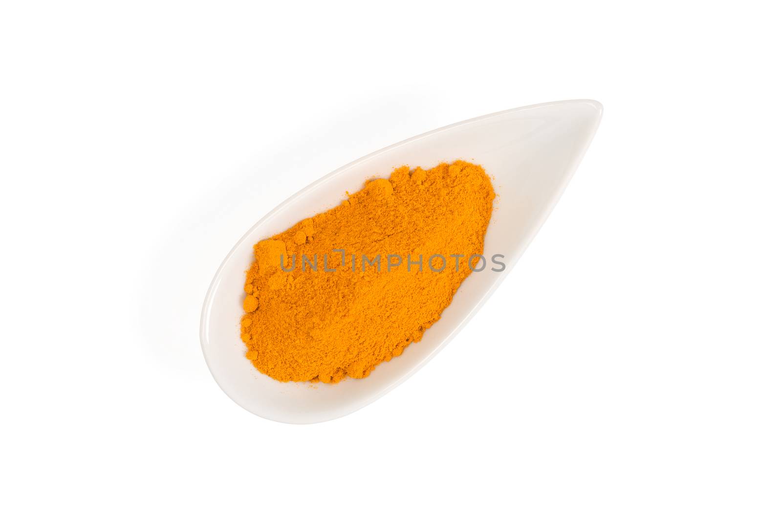 turmeric in white bowl isolated over white background