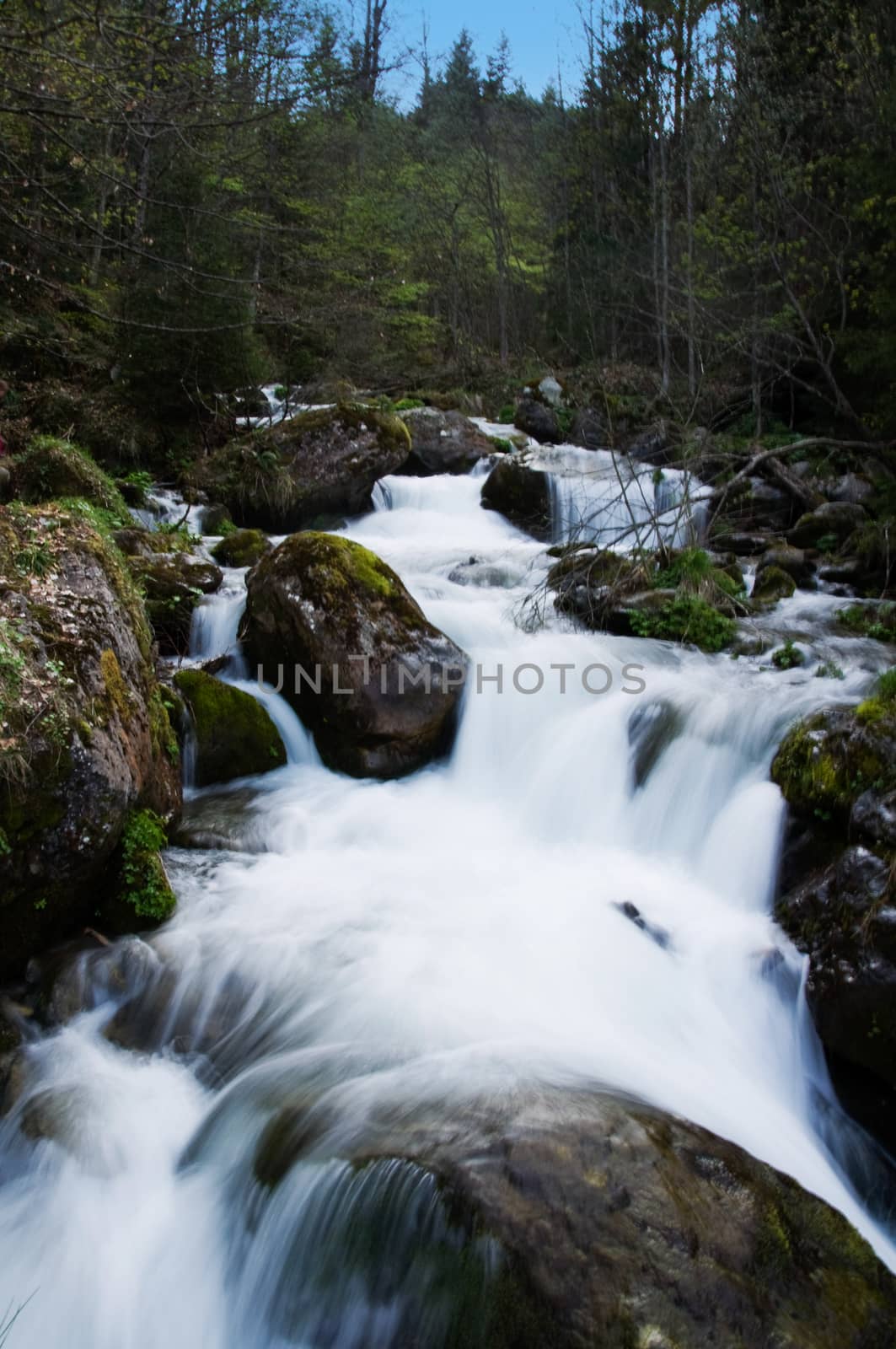 stream flows rapidly down the slope of the mountain Vranica