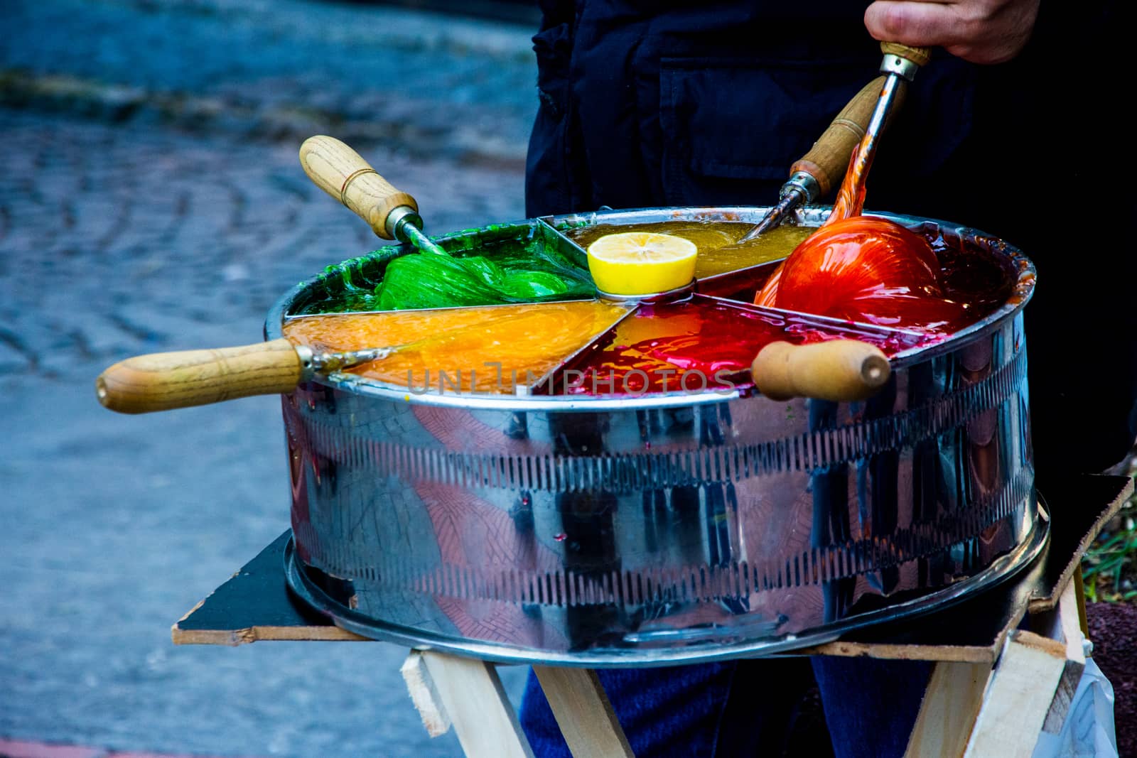 Man is selling Osmanli macunu candies on the street