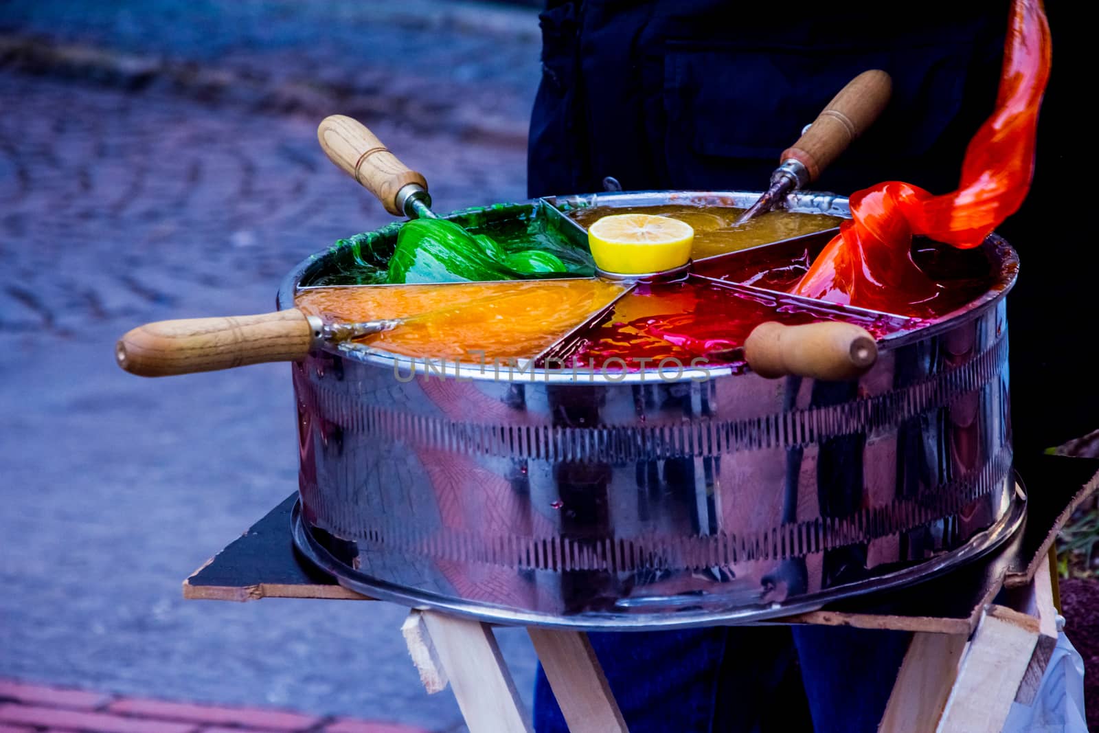 Man is selling Osmanli macunu candies on the street