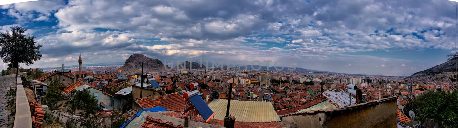 Panoramic view with dramatic coulds and sky from city of Afyon in Turkey