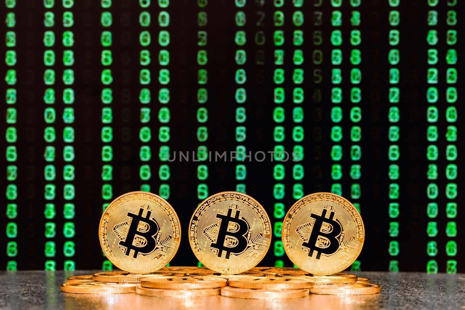 three bitcoins with numbers in backgrounds by zhu_zhu