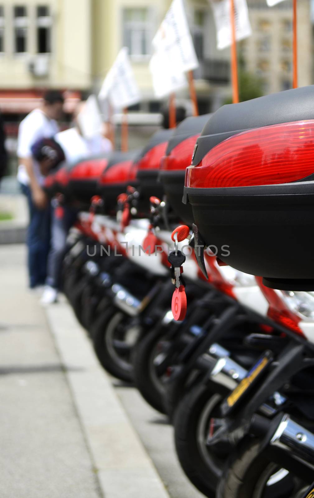 Many small Scooter in row for rent