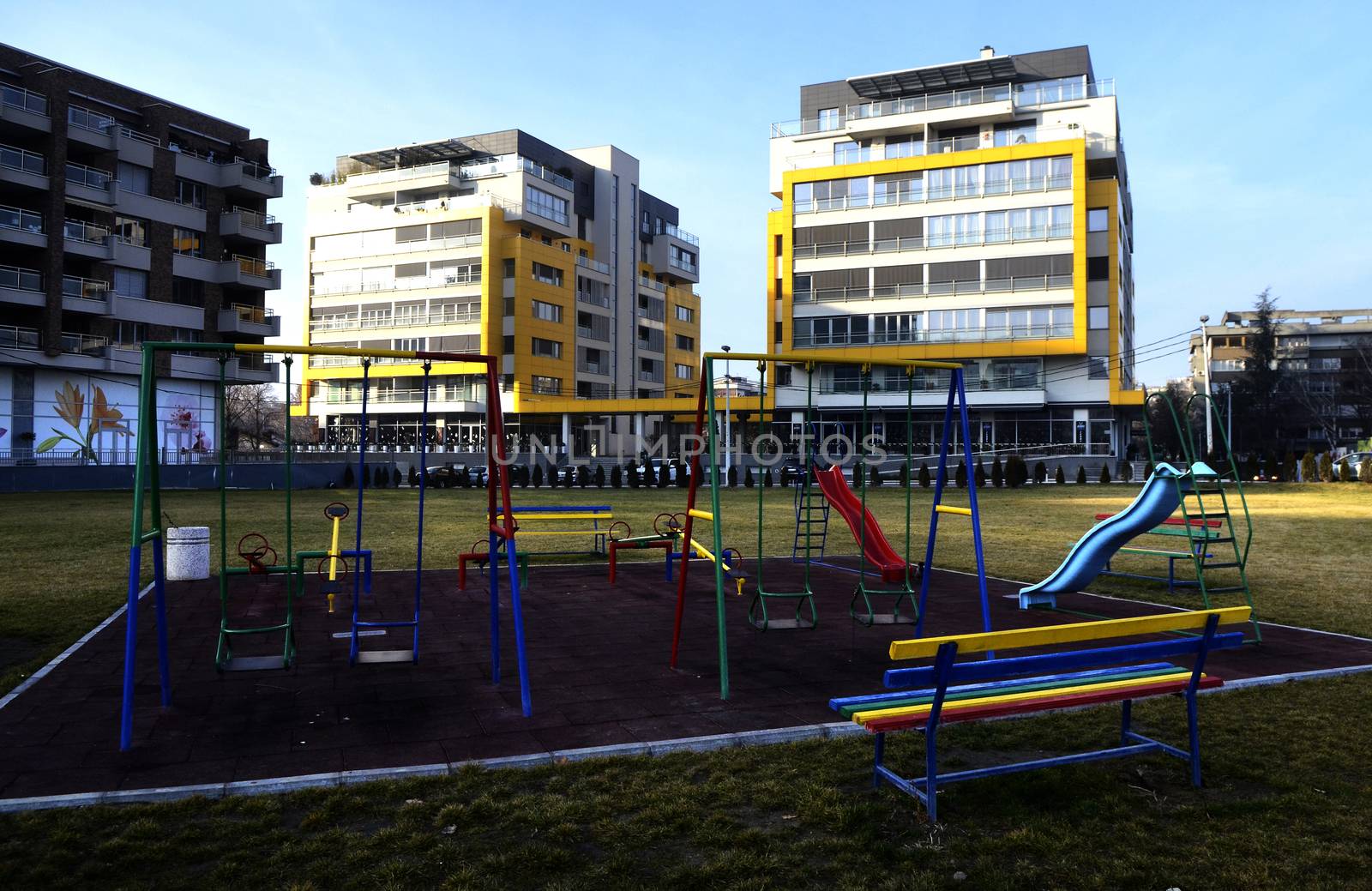 Details of a modern yellow building on sunny day
