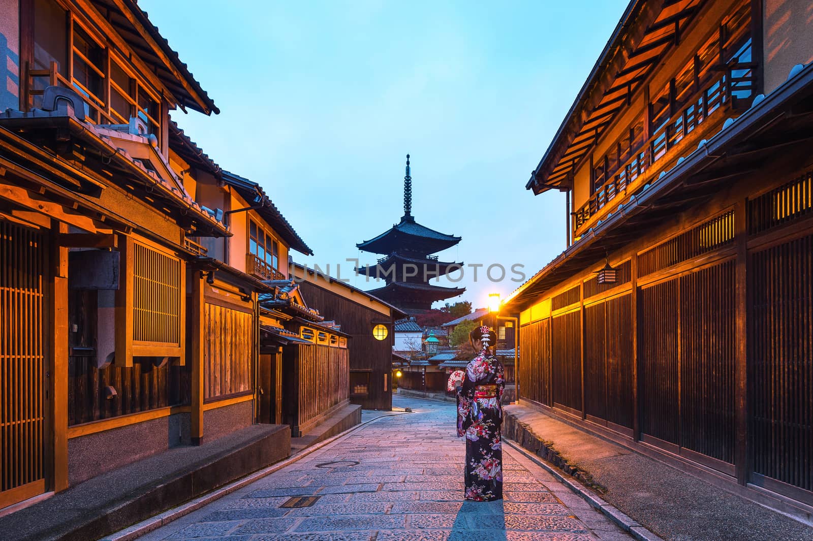 Asian woman wearing japanese traditional kimono at Yasaka Pagoda and Sannen Zaka Street in Kyoto, Japan.