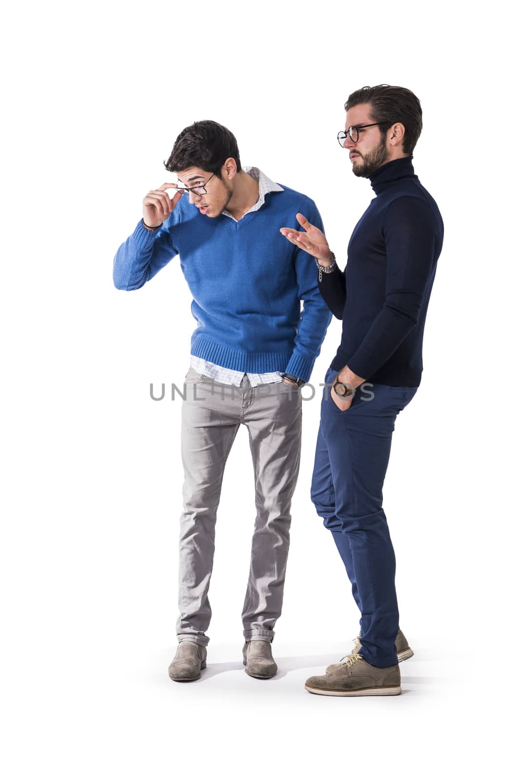 Two good-looking men in stylish clothes by artofphoto