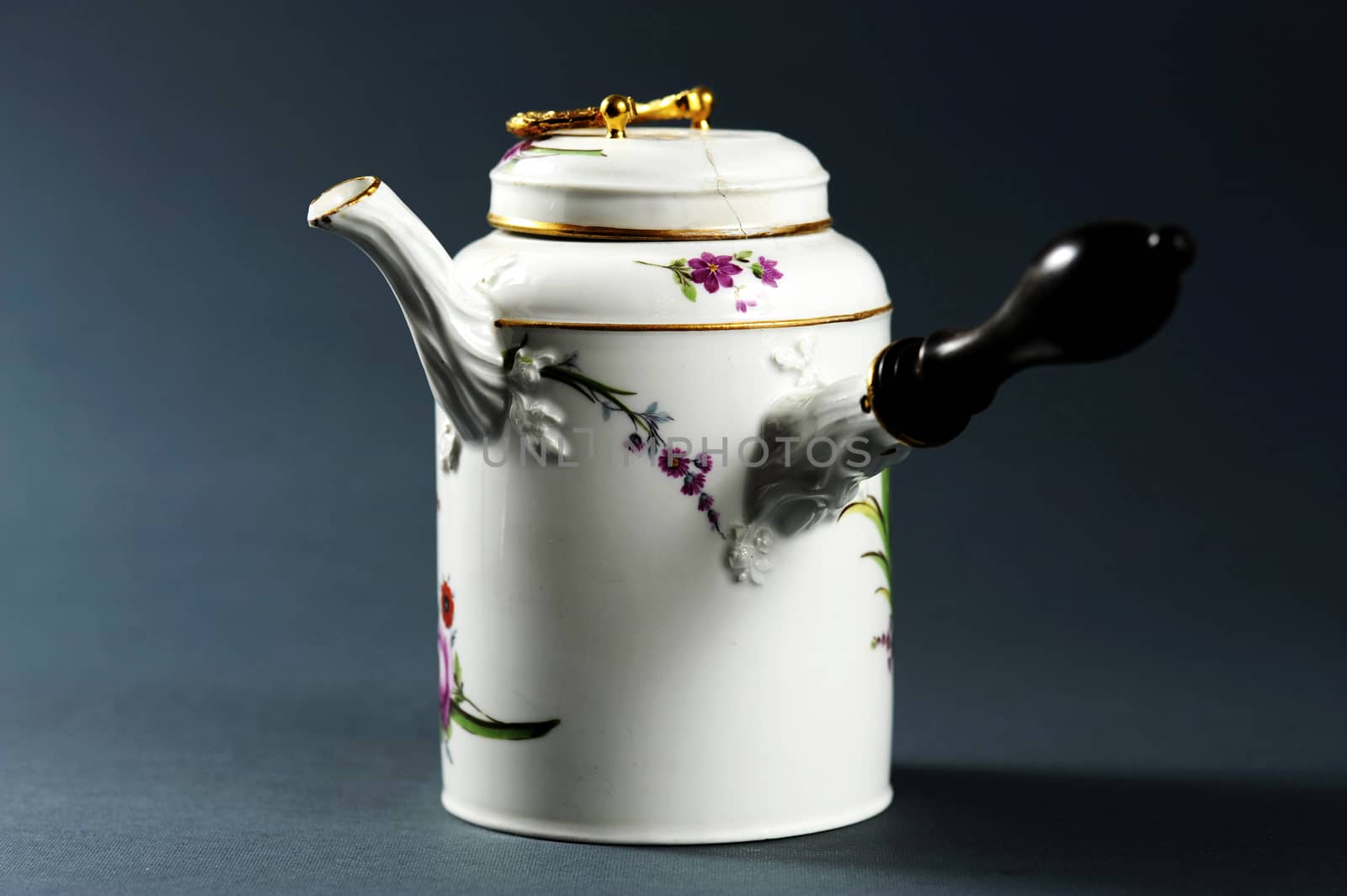 Small beautiful isolated shiny decorative porcelain figure