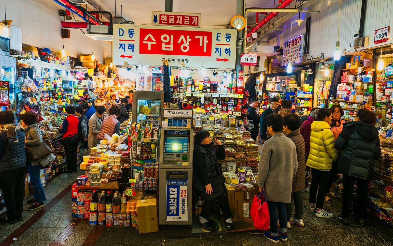 seoul, south korea - 11th november 2017: crowds at the  colorful traditional grocery market selling a zillion items