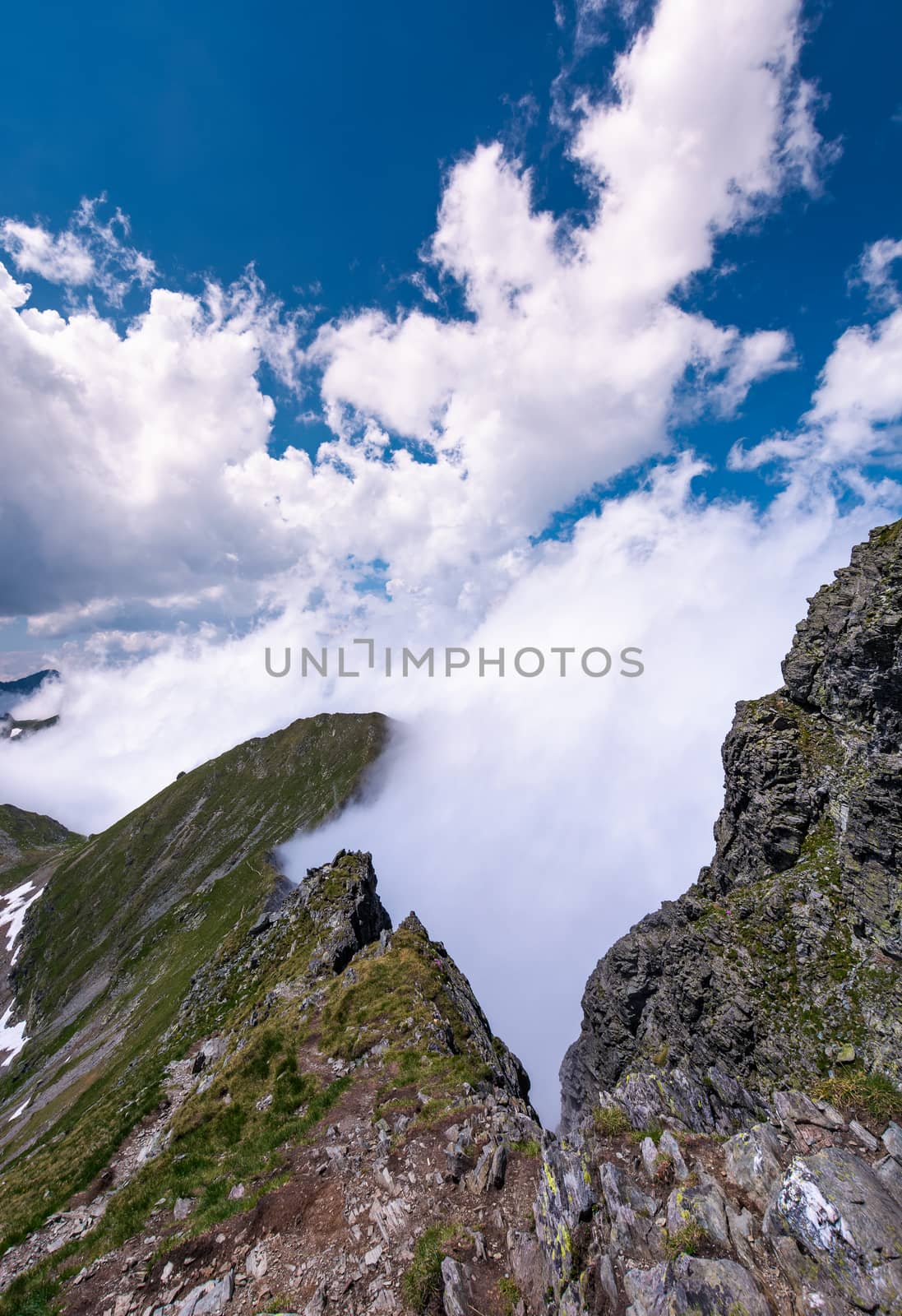 beautiful cloudscape over the cliffs of Fagarasan by Pellinni