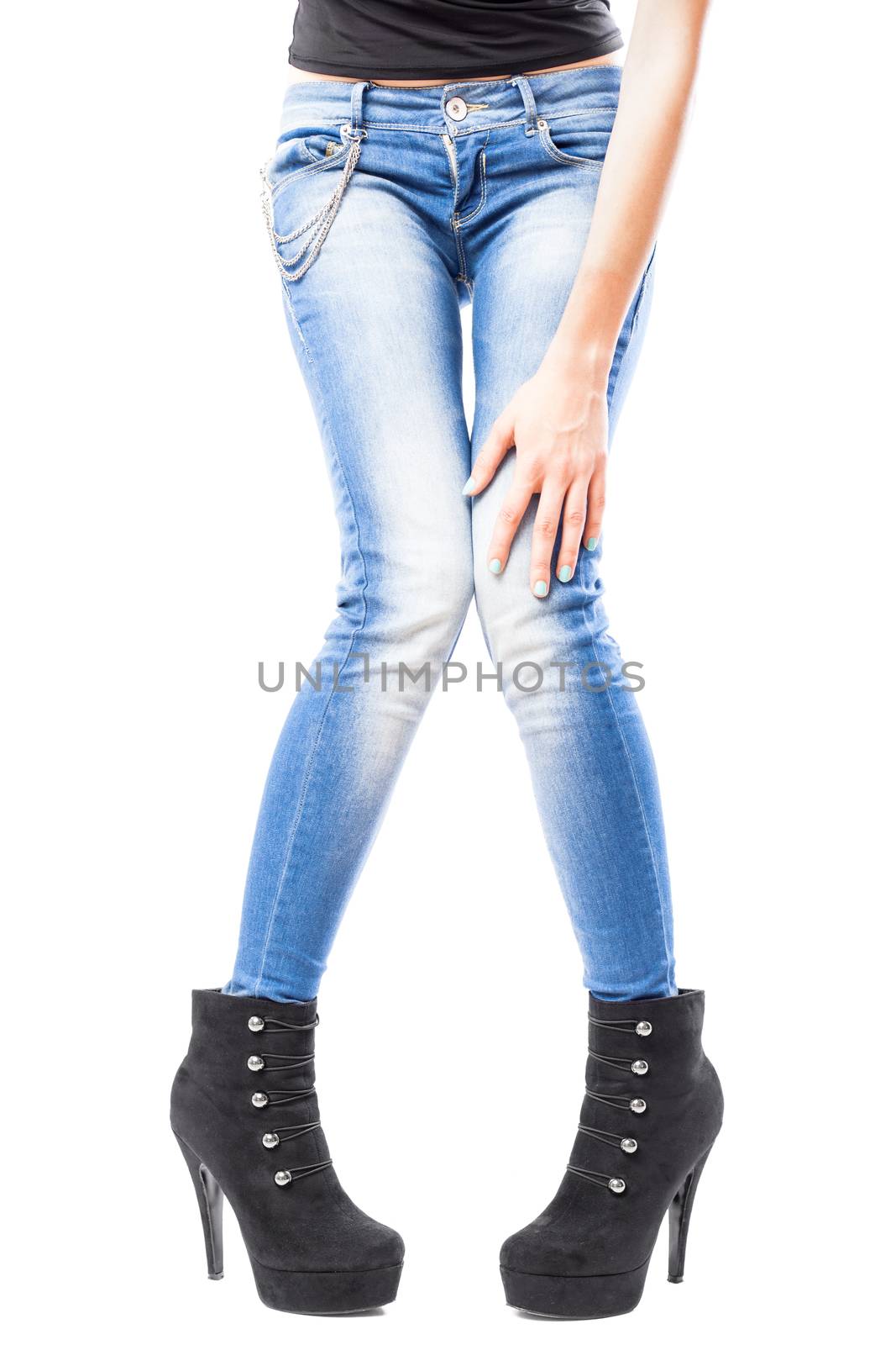 female hand and legs in jeans and high heels by kokimk