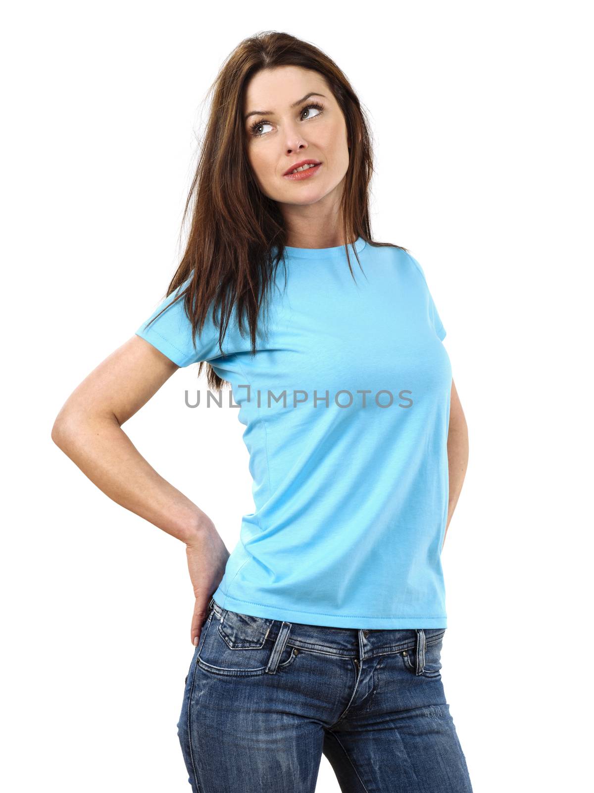 Photo of a beautiful brunette woman posing with a blank light blue t-shirt, ready for your artwork or design.
