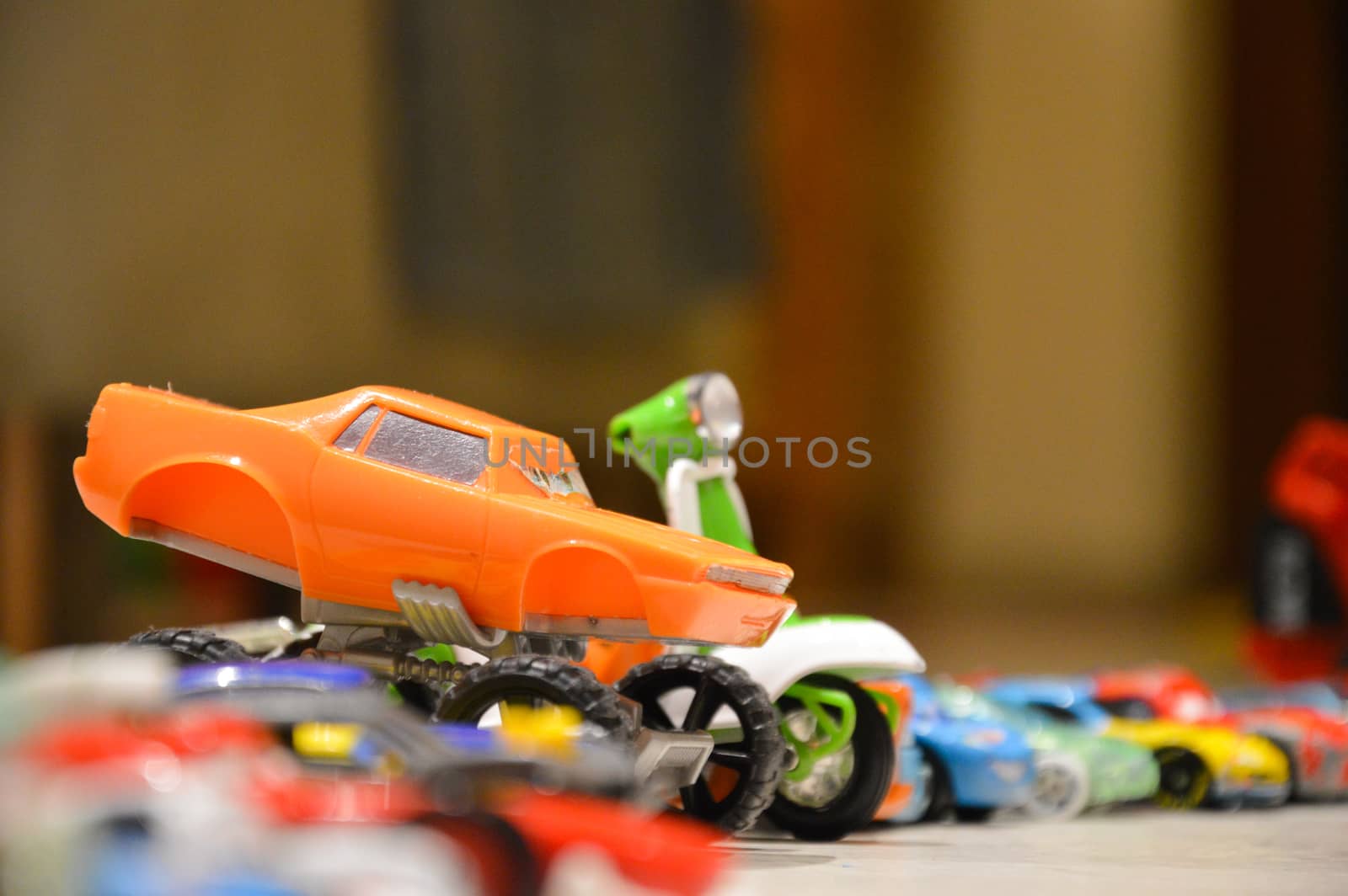 many toy cars in line