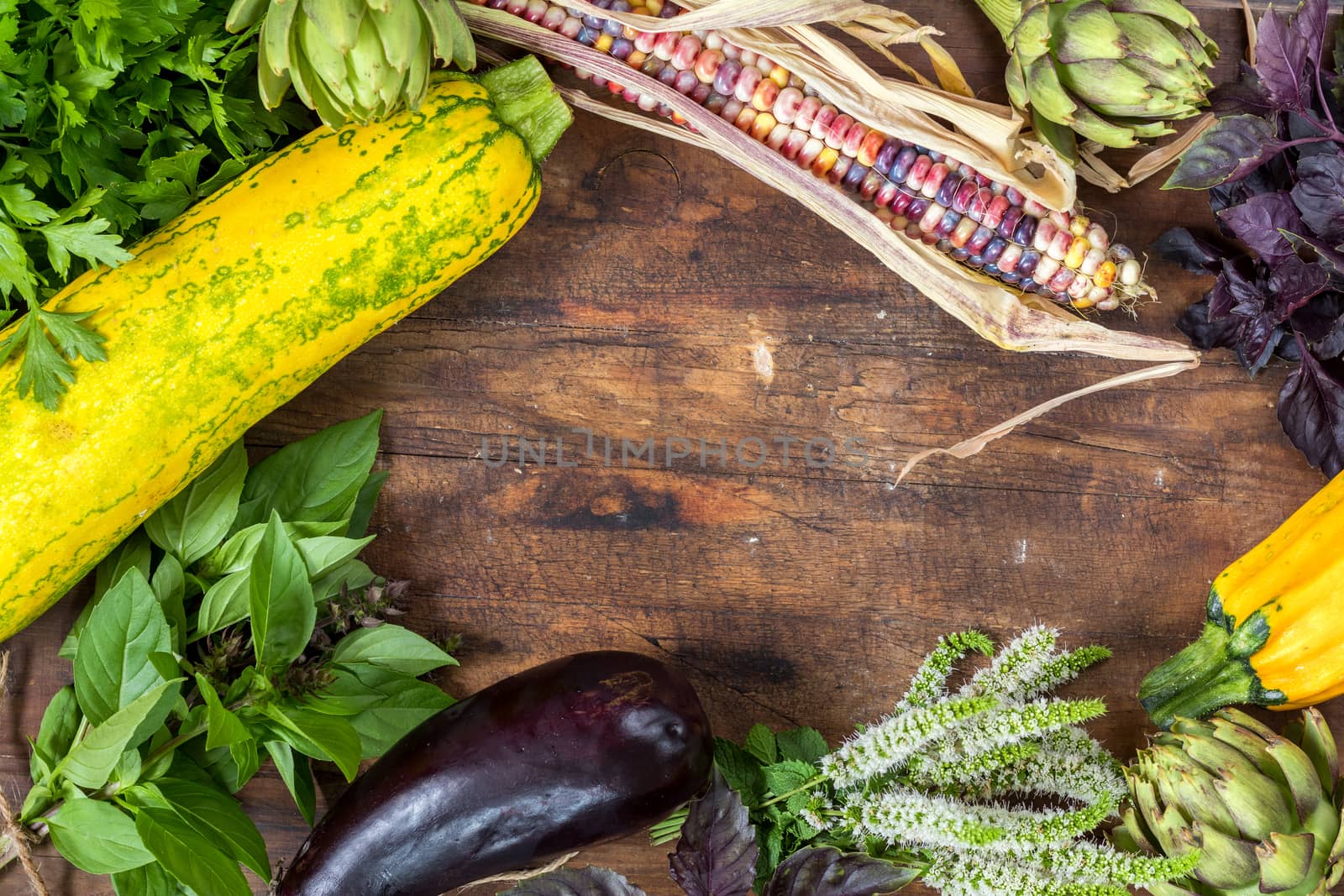 Fresh organic vegetables wooden floor with copy space. Green, yellow and multicolor vegetables background. Healthy eating background. Vegetarian food, organic food.