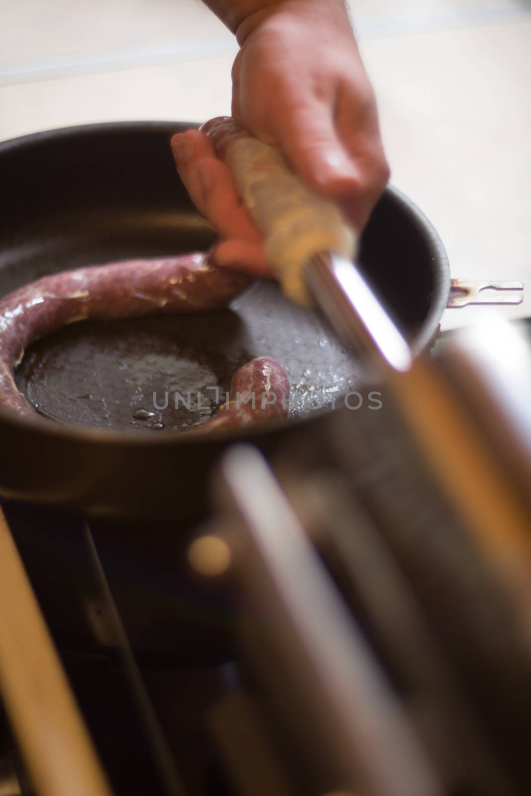 Close up of process of making homemade sausage at home with pressure machine