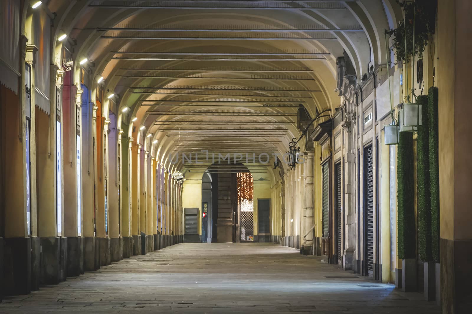 Typical italian portico with columns and arched roof in Turin, Italy