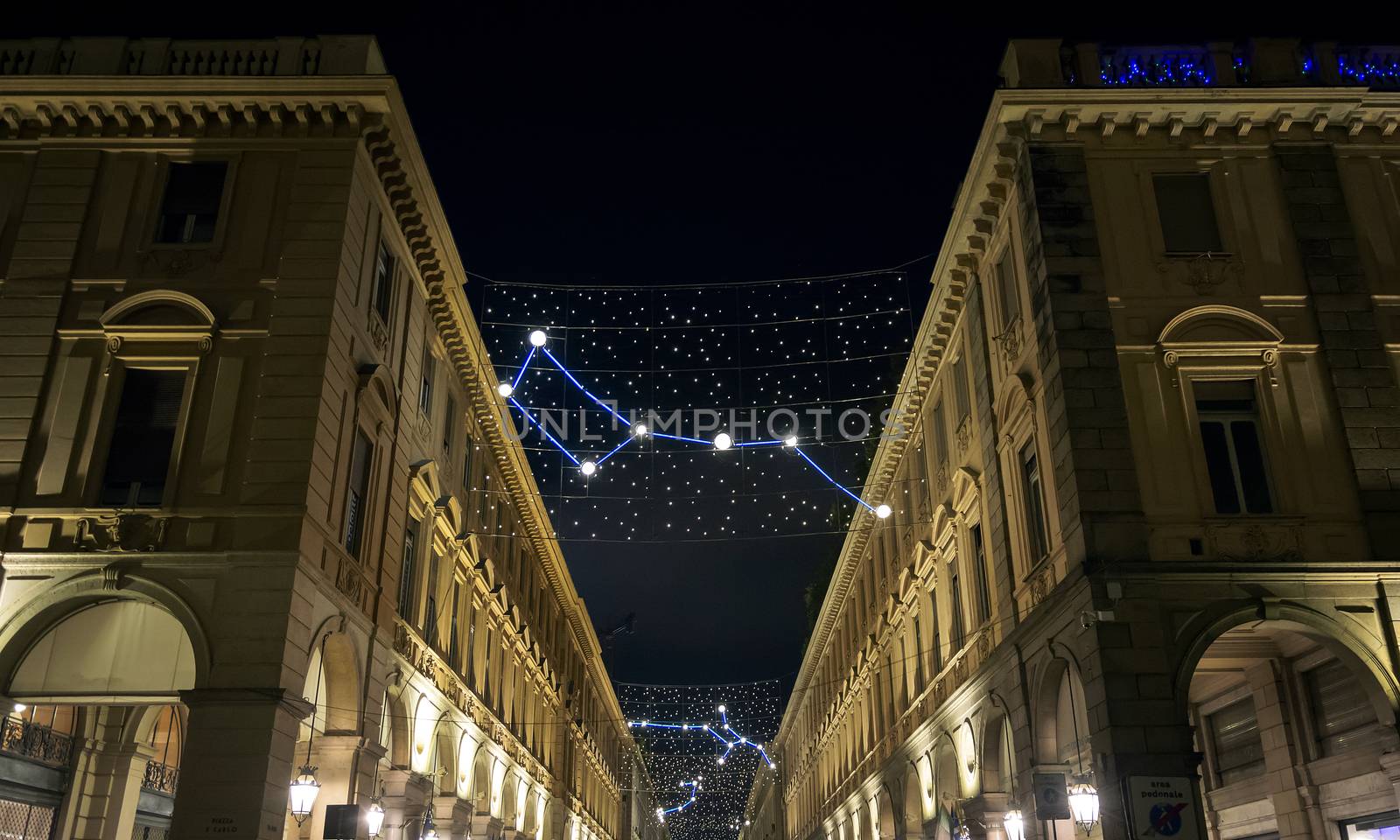 Christmas lights in Turin with constellations and astronomy theme. Night outdoor shot