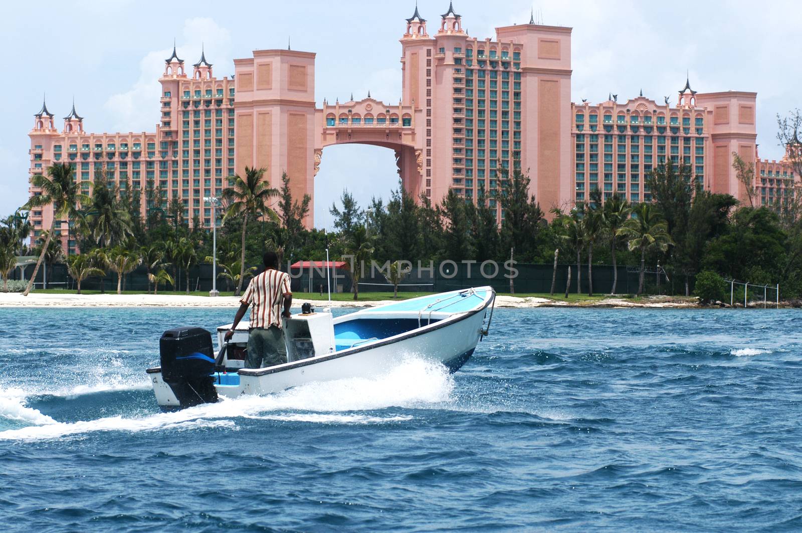 High speed boat moving towards Atlantis hotel in Nassau Bahamas