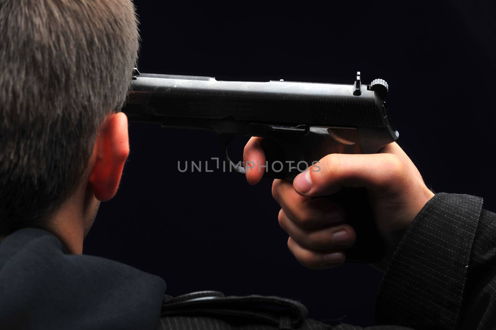 Young man trying to commit suicide with gun