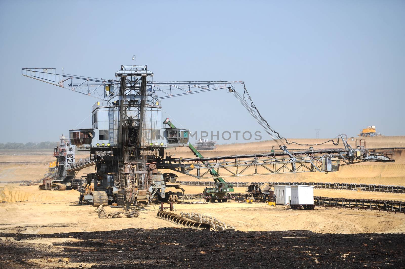 View on large surface coal mine on sunny day